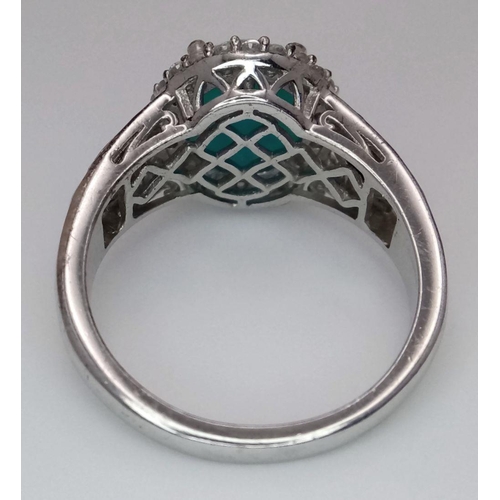 1568 - A Sterling Silver Turquoise Cabochon, Sapphire and White Topaz Set Ring Size S. The Ring is set with... 