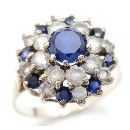 1470 - A Vintage Hallmarked 1986 Silver Sapphire and CZ Cluster Ring Size N. The Crown Measures 1.5cm Wide ... 