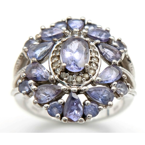 1942 - A Sterling Silver Art Deco Design Tanzanite Set Ring Size S. The Ring measures 2.2cm Wide at the Cro... 