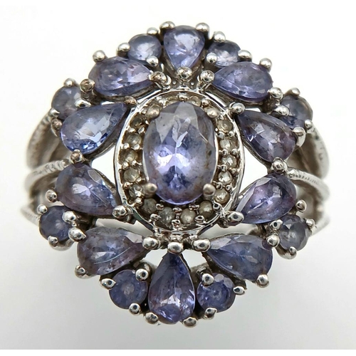 1942 - A Sterling Silver Art Deco Design Tanzanite Set Ring Size S. The Ring measures 2.2cm Wide at the Cro... 