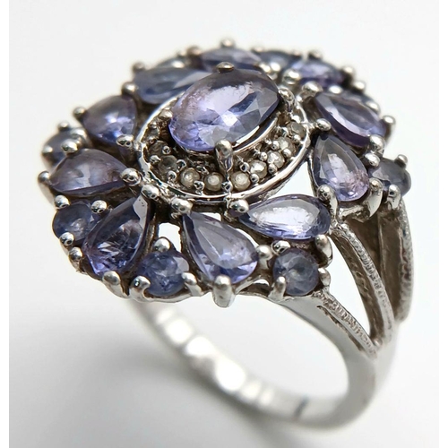 1942 - A Sterling Silver Art Deco Design Tanzanite Set Ring Size S. The Ring measures 2.2cm Wide at the Cro... 