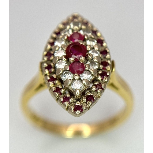 1579 - An 18K Yellow Gold Ruby and Diamond Ring. Marquise shape with ruby and diamond clusters. Size K 1/2.... 