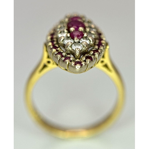 1579 - An 18K Yellow Gold Ruby and Diamond Ring. Marquise shape with ruby and diamond clusters. Size K 1/2.... 