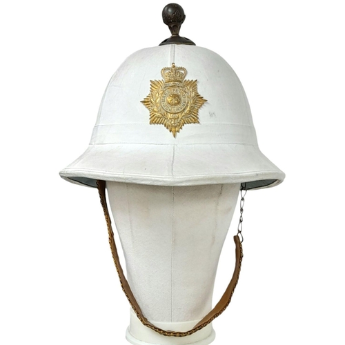 880 - A Royal Marines Band Pith Helmet complete with Queens Crown Helmet Plate and Globe Top Piece.