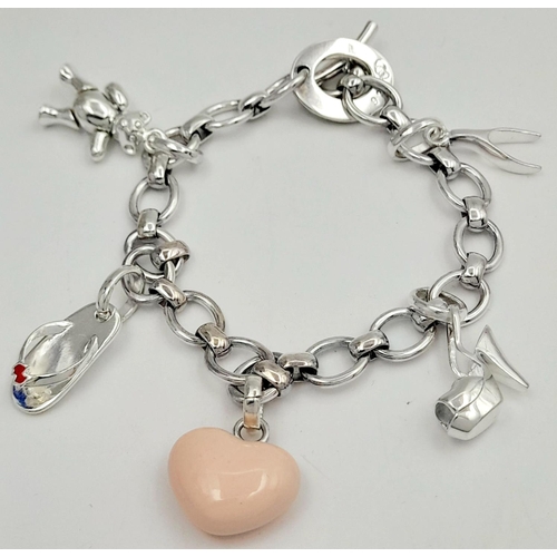 1721 - A sterling silver charm bracelet, 28g total weight, 19.4cm total length. Ref SH8673H