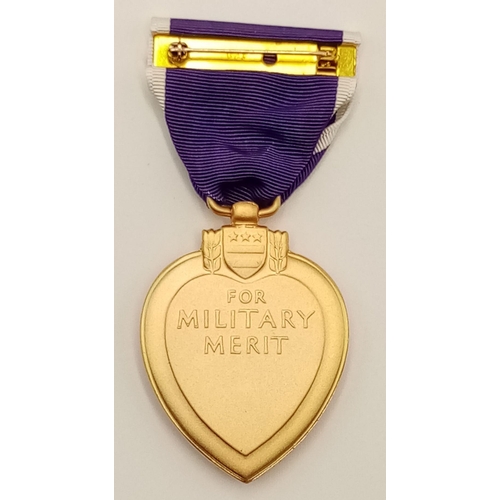 719 - A Vietnam War Era Purple Heart in original case. The ribbon bar is missing as it would have been on ... 