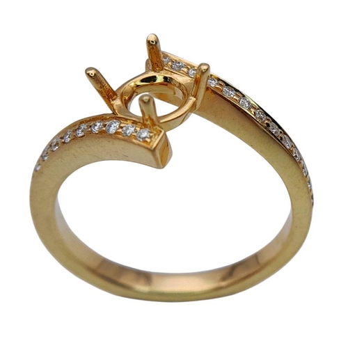 111 - A 18K YELLOW GOLD DIAMOND SET TWIST RING. MOUNT READY TO SET YOUR DREAM CENTRE STONE HOLDS A 0.60CT ... 