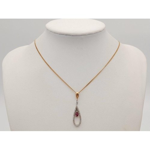 167 - A 9K YELLOW GOLD DIAMOND & RUBY SET PENDANT ON CHAIN.  3.2G. 3CM AND 46CM.