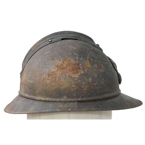 201 - A WW1 French Infantry M1915 Adrianne Helmet with liner. Much of the original Paint remaining.