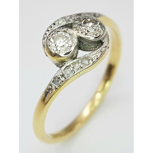 223 - A 18K YELLOW GOLD & PLATINUM VINTAGE 2 STONE OLD CUT DIAMOND TWIST RING 2.6G SIZE P. Ref: SC 7064