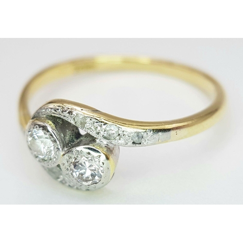 223 - A 18K YELLOW GOLD & PLATINUM VINTAGE 2 STONE OLD CUT DIAMOND TWIST RING 2.6G SIZE P. Ref: SC 7064