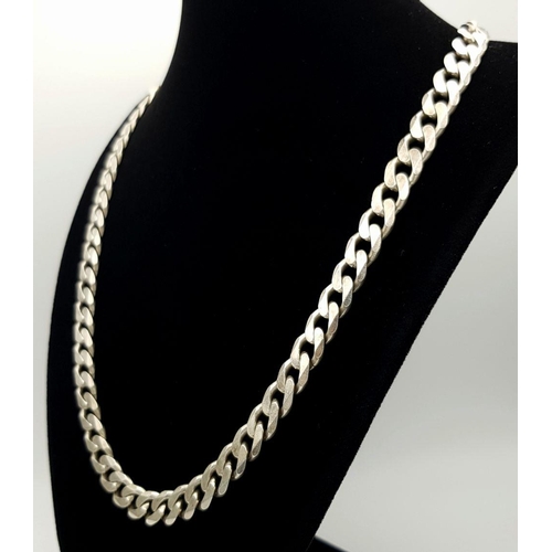 254 - An Appealing Solid Silver 925 Heavy Curb Chain Necklace, 65.4 grams, 51.5cm. In excellent condition.