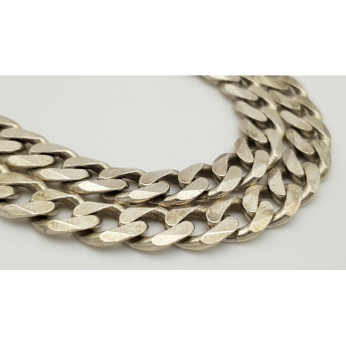 254 - An Appealing Solid Silver 925 Heavy Curb Chain Necklace, 65.4 grams, 51.5cm. In excellent condition.