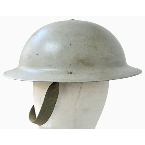 299 - A WW2 British J.S.S Mk II Helmet in Battleship Grey. There is a small hand painted WRENs logo on the... 