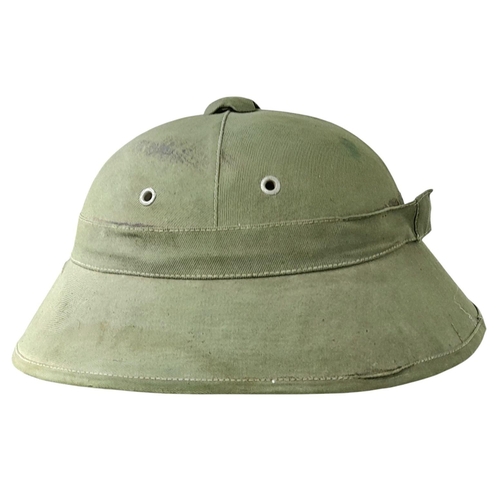 348 - An Indo China Viet Minh 1950’s Fibre Helmet. These are a slightly different shape to those used duri... 