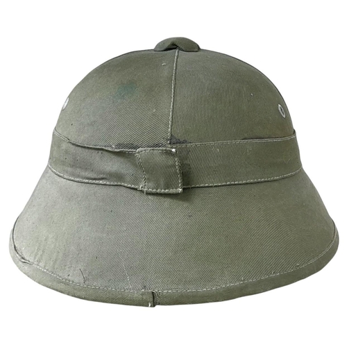 348 - An Indo China Viet Minh 1950’s Fibre Helmet. These are a slightly different shape to those used duri... 