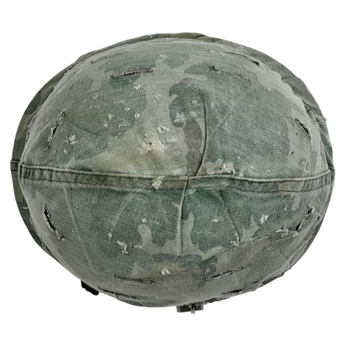 390 - A Vietnam War Era US M1 Helmet with liner, chin strap and reversible Mitch/Duck Hunter cover.