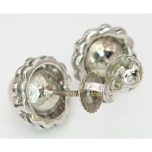 41 - A 18K WHITE GOLD DIAMOND & PEARL STUD EARRINGS WITH SCREW BACK FITTINGS 0.50CT 4.9G. Ref: SC 7070