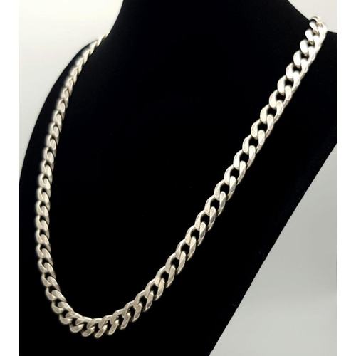 437 - An Attractive Solid Silver 925 Heavy Curb Chain Necklace, 53.5 grams, 50cm. In excellent condition.