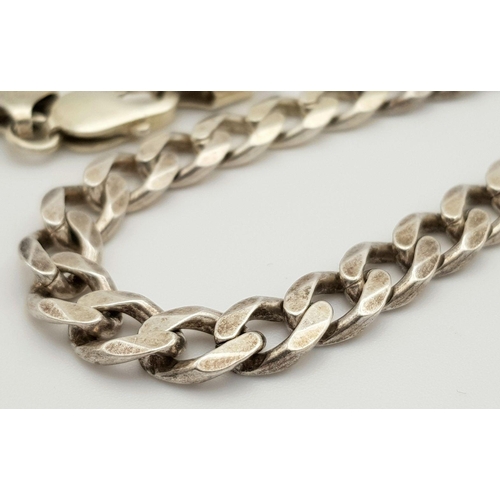 437 - An Attractive Solid Silver 925 Heavy Curb Chain Necklace, 53.5 grams, 50cm. In excellent condition.