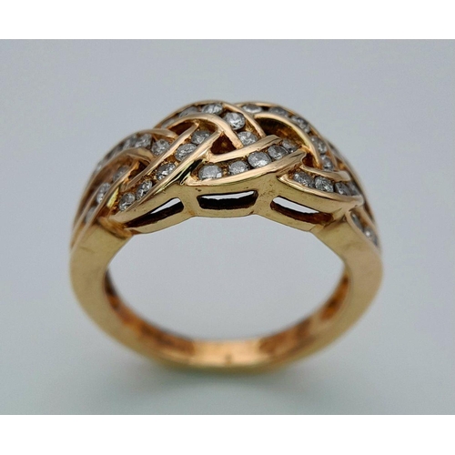 524 - A 9K YELLOW GOLD DIAMOND SET CELTIC DESIGN RING 0.50CT 4.7G TOTAL WEIGHT , SIZE L 1/2. Ref: SC 7009