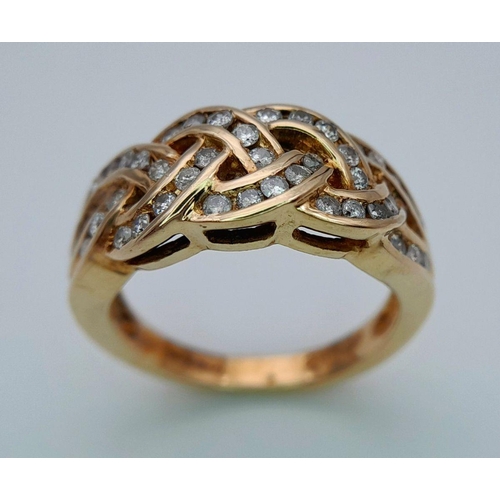 524 - A 9K YELLOW GOLD DIAMOND SET CELTIC DESIGN RING 0.50CT 4.7G TOTAL WEIGHT , SIZE L 1/2. Ref: SC 7009