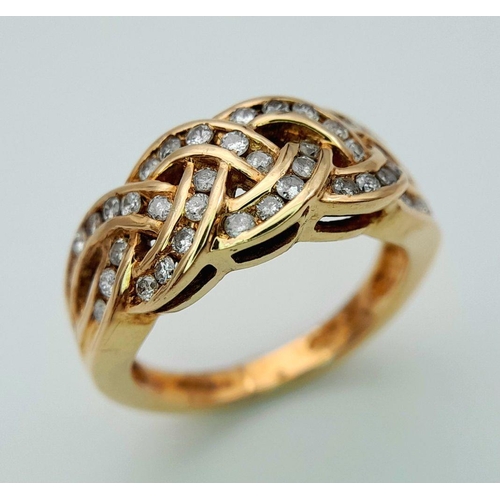 524 - A 9K YELLOW GOLD DIAMOND SET CELTIC DESIGN RING 0.50CT 4.7G TOTAL WEIGHT , SIZE L 1/2. Ref: SC 7009