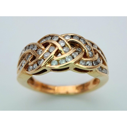 524 - A 9K YELLOW GOLD DIAMOND SET CELTIC DESIGN RING 0.50CT 4.7G TOTAL WEIGHT , SIZE L 1/2. Ref: SC 7009