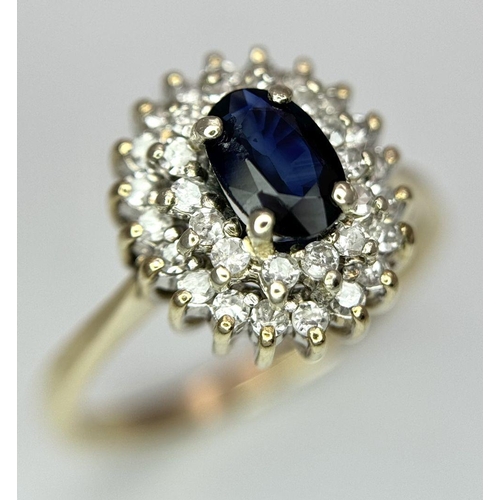 552 - A 9K YELLOW GOLD DIAMOND & SAPPHIRE CLUSTER RING 2.6G TOTAL WEIGHT, SIZE L 1/2. Ref: SC 7028