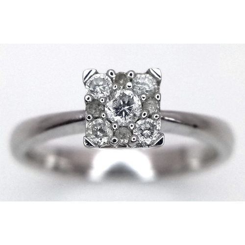 580 - A 9K WHITE GOLD DIAMOND RING 0.15CT , 1.9G TOTAL WEIGHT, SIZE H. Ref: SC 7021