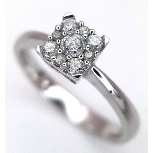 580 - A 9K WHITE GOLD DIAMOND RING 0.15CT , 1.9G TOTAL WEIGHT, SIZE H. Ref: SC 7021