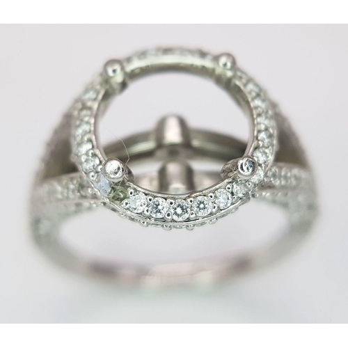 62 - A PLATINUM DIAMOND SET RING MOUNT - WILL HOLD A 2.75CT - 3CT ROUND STONE. 6.1G. SIZE J.