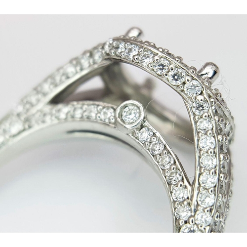 62 - A PLATINUM DIAMOND SET RING MOUNT - WILL HOLD A 2.75CT - 3CT ROUND STONE. 6.1G. SIZE J.