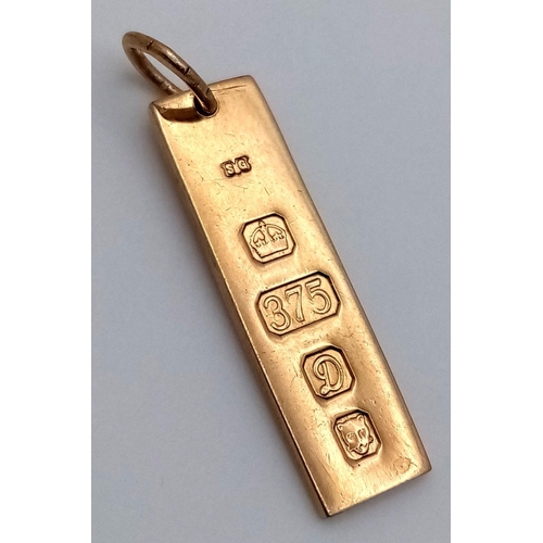 685 - A 9K YELLOW GOLD INGOT CHARM 2.1G , 2.5CM X 0.7CM. Ref: SC 7045