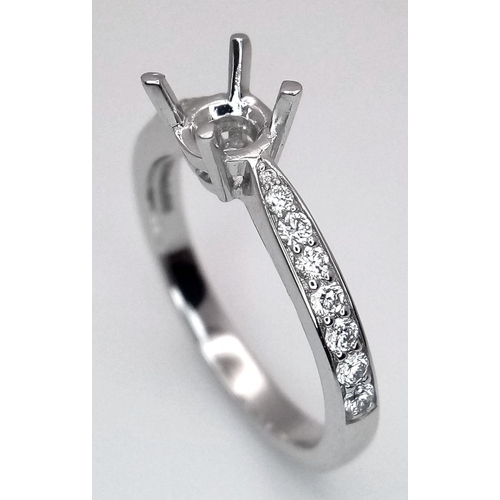 69 - A PLATINUM DIAMOND SET RING MOUNT READY TO HOLD YOUR DREAM STONE - WILL TAKE A 0.50CT ROUND STONE. 5... 