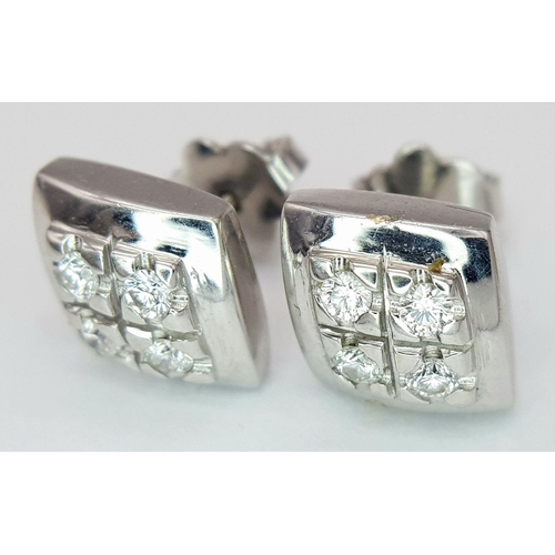 83 - A PAIR OF 18K WHITE GOLD DIAMOND SET STUD EARRINGS 4.7G TOTAL WEIGHT. Ref: SC 7096