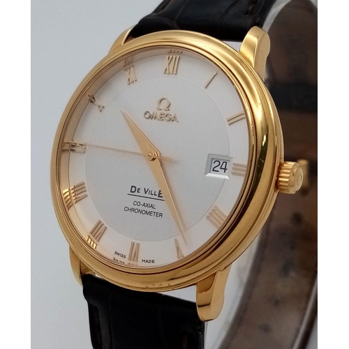 92 - An Omega Deville Prestige 18K Gold Cased Watch. Black leather strap with original gold buckle. 18k g... 