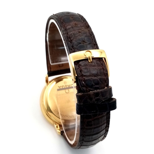 92 - An Omega Deville Prestige 18K Gold Cased Watch. Black leather strap with original gold buckle. 18k g... 