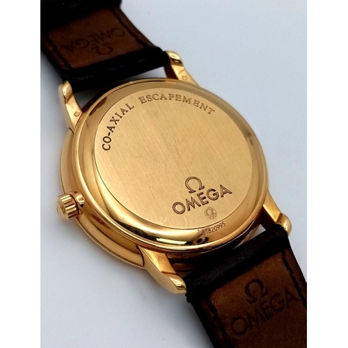 92 - An Omega Deville Prestige 18K Gold Cased Watch. Black leather strap with original gold buckle. 18k g... 