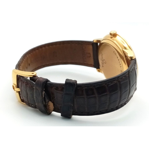 92 - An Omega Deville Prestige 18K Gold Cased Watch. Black leather strap with original gold buckle. 18k g... 