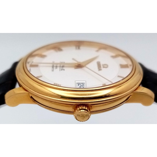 92 - An Omega Deville Prestige 18K Gold Cased Watch. Black leather strap with original gold buckle. 18k g... 