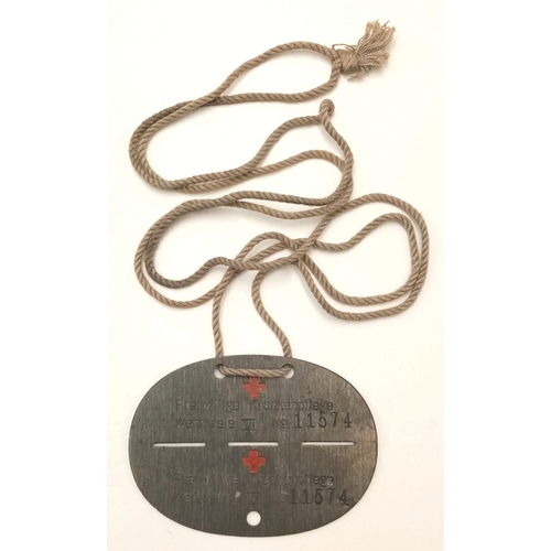 1009 - A 3rd Reich DRK (German Red Cross) Nurses Dog Tag.