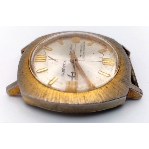 2285 - A Vintage Grand Prix 21st Street Watch Stainless Steel Case and Movement. 38mm width. Silver tone di... 