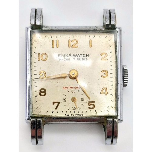 2280 - A Vintage Emka Watch Stainless Steel Case and Movement. 
27mm width. Silver tone dial with second su... 