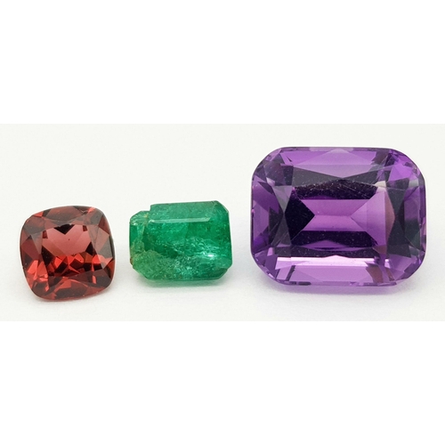 1996 - A Trio of Gemstones. A 0.92ct Pakistani Emerald - octagon shape, step cut. A 1.09ct Tanzanian Malaya... 