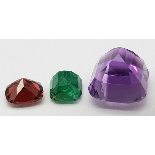 1996 - A Trio of Gemstones. A 0.92ct Pakistani Emerald - octagon shape, step cut. A 1.09ct Tanzanian Malaya... 