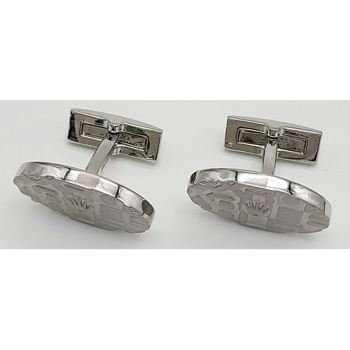 1893 - A modern, stainless-steel pair of ROLEX cufflinks in new/unused condition, in a presentation box (no... 