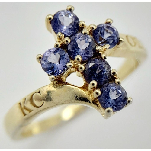 1961 - A Yellow Gold Gilt Sterling Silver Tanzanite Set Cross Ring Size M1/2. The Cross Measures 1.2cm Leng... 