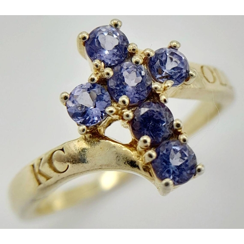 1961 - A Yellow Gold Gilt Sterling Silver Tanzanite Set Cross Ring Size M1/2. The Cross Measures 1.2cm Leng... 