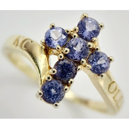 1961 - A Yellow Gold Gilt Sterling Silver Tanzanite Set Cross Ring Size M1/2. The Cross Measures 1.2cm Leng... 